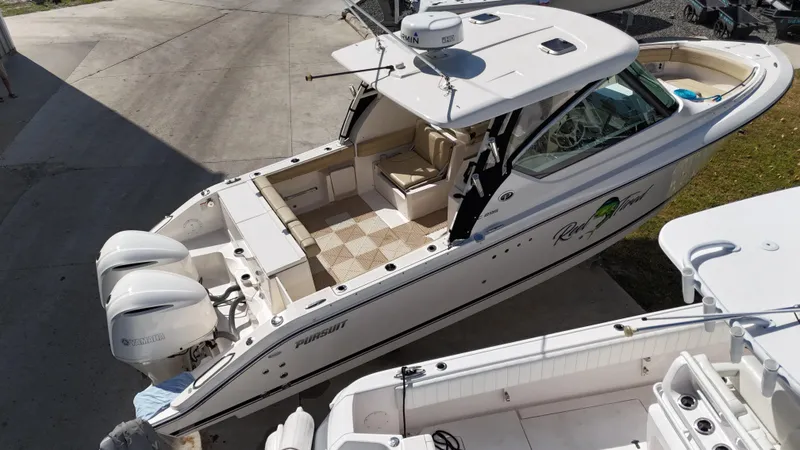Slide: The Image of 2016 Pursuit DC 295 Dual Console boat with twin Yamaha 300 engines, clean condition. - 3