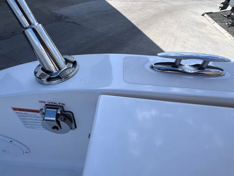 Slide: The Image of 2016 Pursuit DC 295 boat deck with cleat and stainless steel fittings. - 31