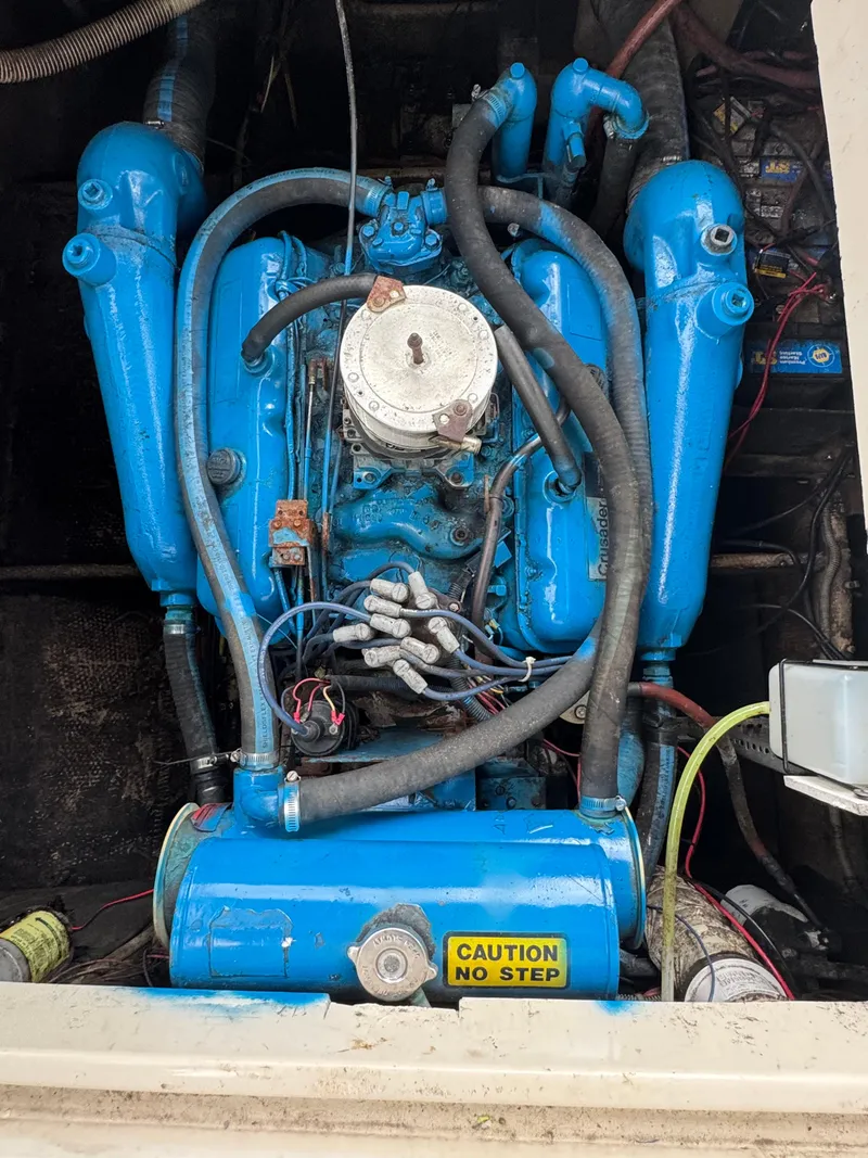 Slide: The Image of 1987 Silverton Express engine, blue, with "Caution No Step" label. - 12