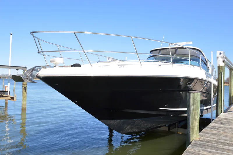 Slide: The Image of 2007 Sea Ray 44 Sundancer yacht docked on a sunny day. - 10