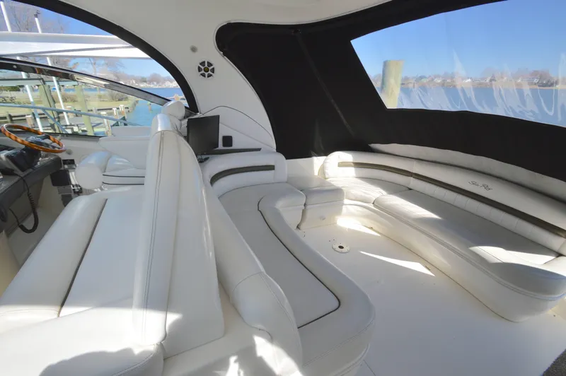 Slide: The Image of Luxurious interior of 2007 Sea Ray 44 Sundancer yacht with white leather seating. - 16