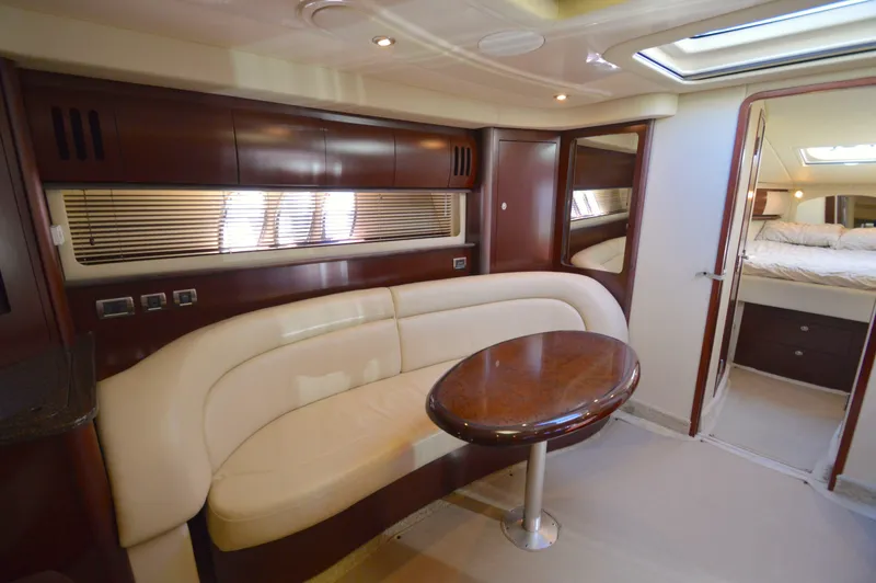 Slide: The Image of Luxurious interior of 2007 Sea Ray 44 Sundancer yacht with elegant seating and table. - 40