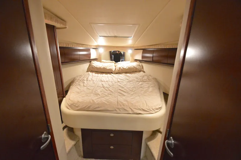 Slide: The Image of Luxurious cabin interior of 2007 Sea Ray 44 Sundancer yacht with cozy bed. - 43