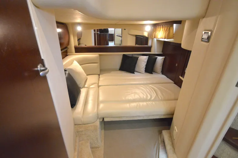 Slide: The Image of Luxurious interior of 2007 Sea Ray 44 Sundancer yacht with plush seating and elegant decor. - 51