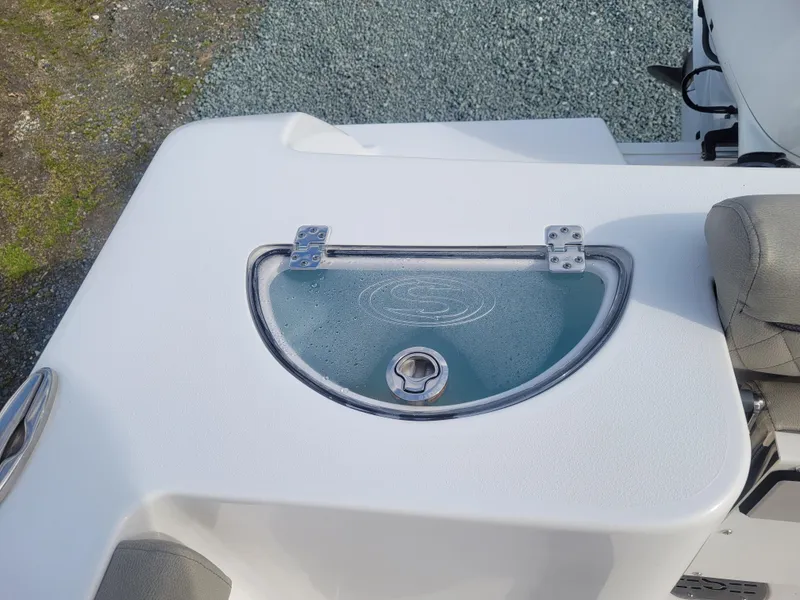 Slide: The Image of 2023 Sportsman Open 232 Center Console livewell with clear lid and latch. - 14