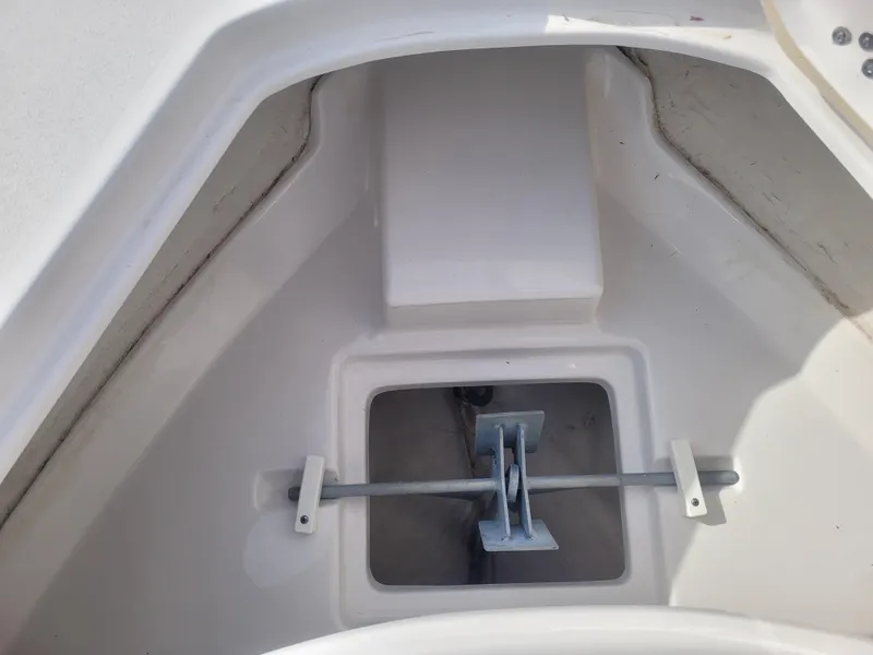 Slide: The Image of 2023 Sportsman Open 232 Center Console anchor storage compartment. - 27