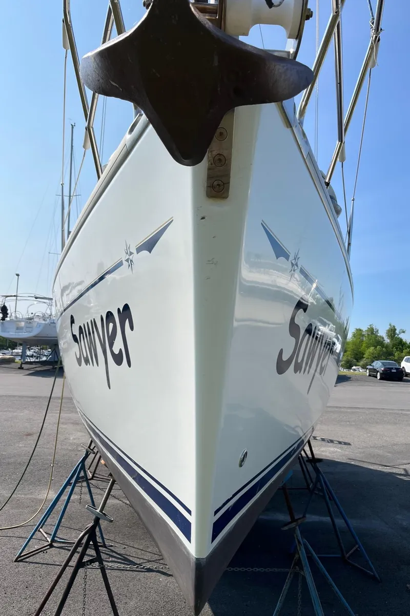 Slide: The Image of 2004 Jeanneau SO 37 sailboat on stands, viewed from the bow. - 10
