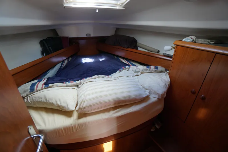 Slide: The Image of Cozy cabin interior of 2004 Jeanneau SO 37 sailboat with comfortable bedding. - 6