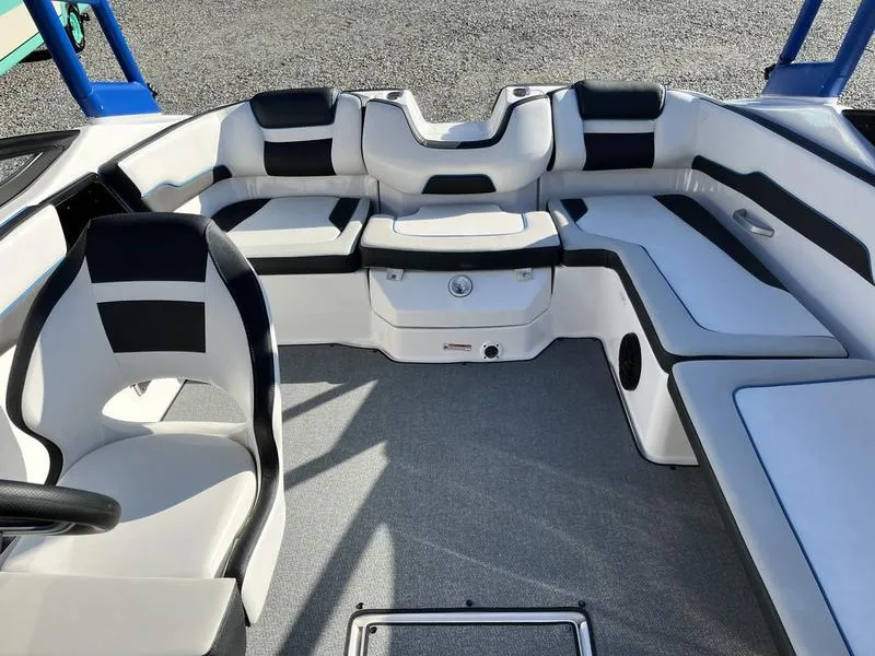 Slide: The Image of 2021 Yamaha AR195 boat interior with sleek seating and modern design. - 12