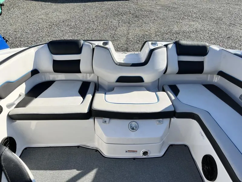 Slide: The Image of 2021 Yamaha AR195 boat interior with cushioned seating and modern design. - 19