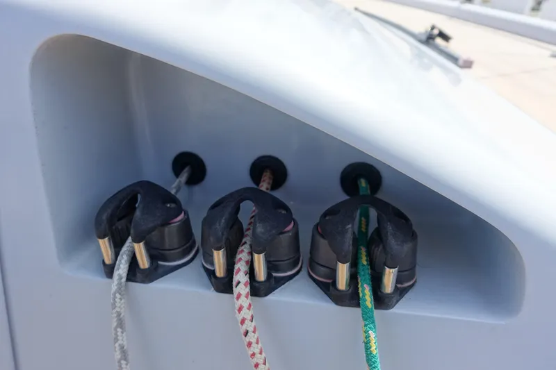 Slide: The Image of Close-up of sailing ropes on a 2006 Maxi Dolphin CrossCurrent 33 yacht. - 13