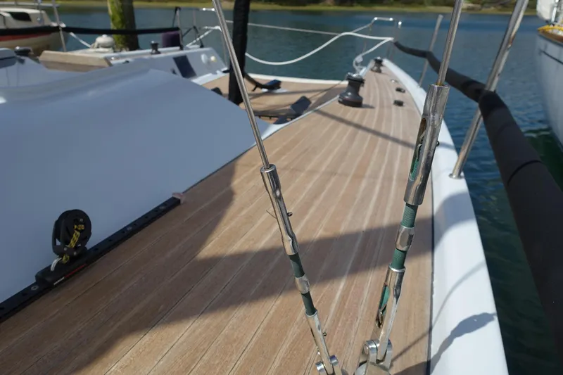 Slide: The Image of Deck view of 2006 Maxi Dolphin CrossCurrent 33 sailboat, featuring sleek design and rigging. - 16