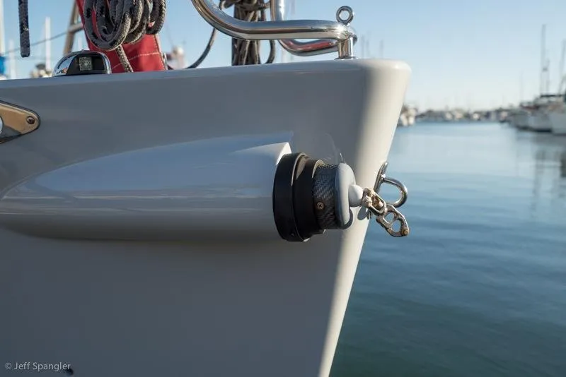 Slide: The Image of Bow of 2006 Maxi Dolphin CrossCurrent 33 sailboat in marina setting. - 35