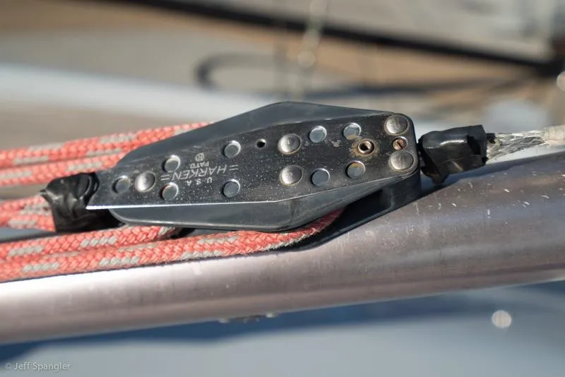 Slide: The Image of Close-up of a Harken block on a 2006 Maxi Dolphin CrossCurrent 33 sailboat. - 46