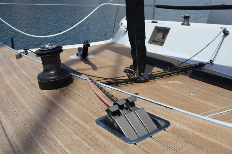 Slide: The Image of Maxi Dolphin CrossCurrent 33 sailboat deck, featuring winch and rigging, 2006 model. - 7