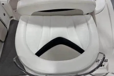 Slide: The Image of 2007 Chaparral 276 SSi boat seat, white leather with black accent. - 22