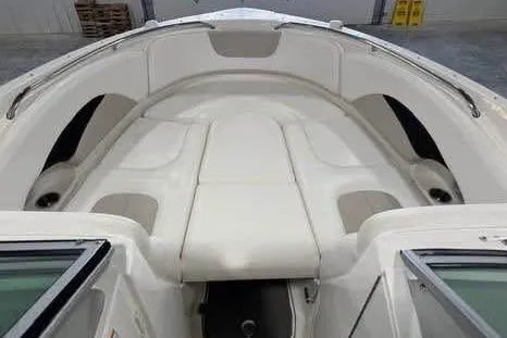 Slide: The Image of 2007 Chaparral 276 SSi boat interior with white seating and spacious layout. - 23