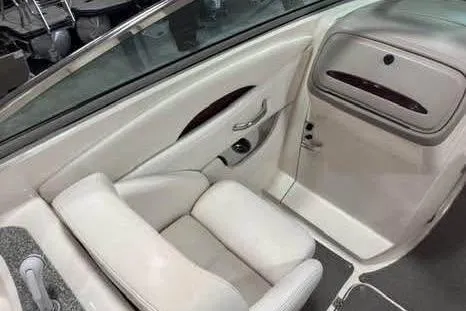 Slide: The Image of 2007 Chaparral 276 SSi boat interior with white seating and sleek design. - 24