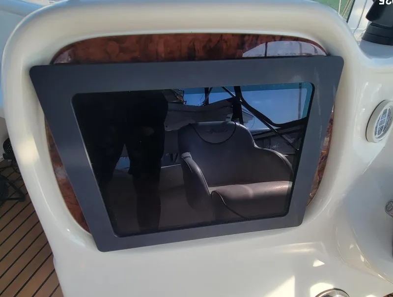 Slide: The Image of Control panel of a 2000 Sea Ray 380 Aft Cabin yacht, featuring a sleek design. - 14