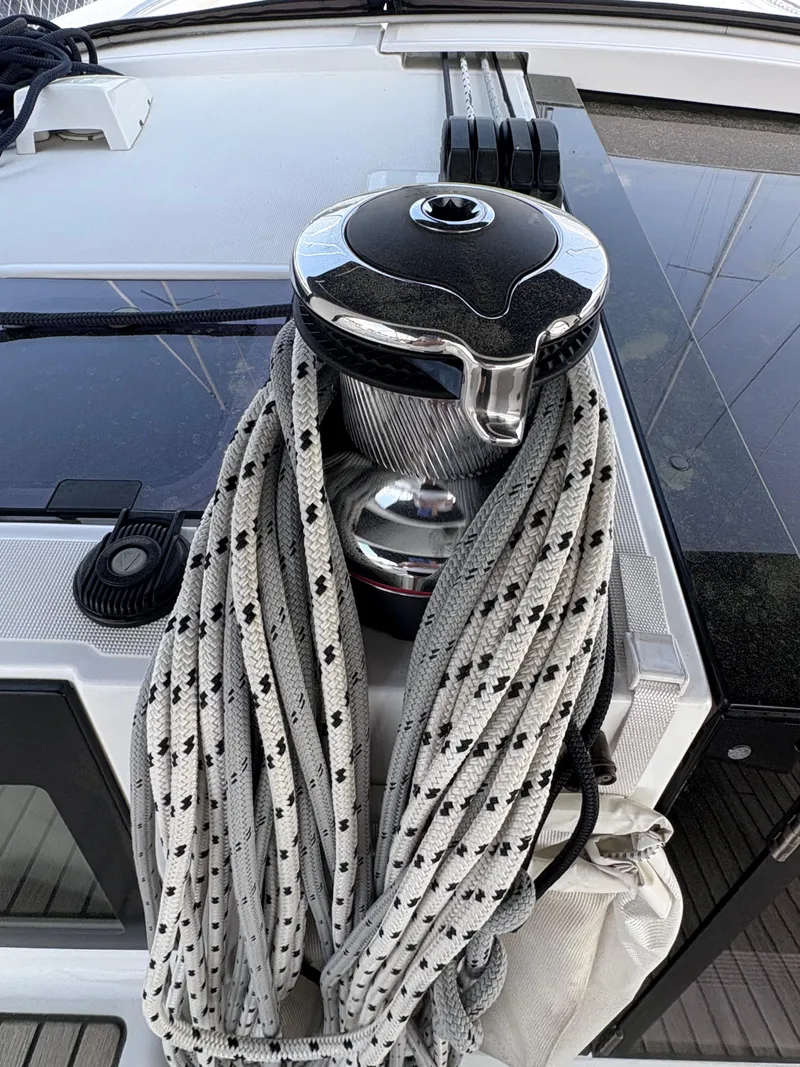 Slide: The Image of Winch with rope on 2018 Beneteau Oceanis 45 sailboat deck. - 11