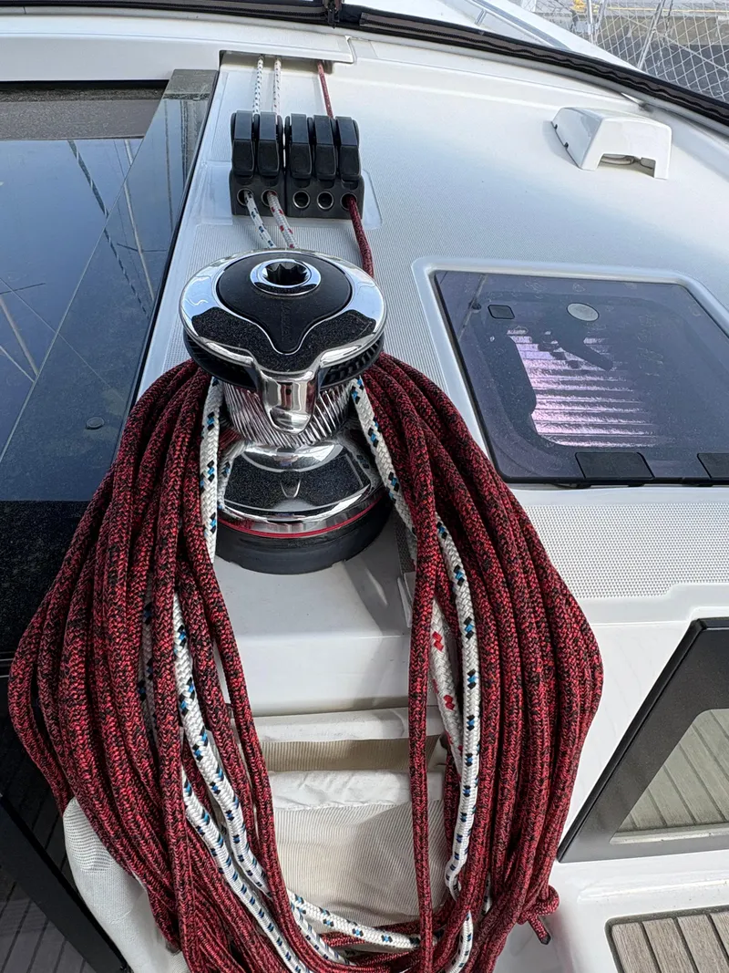 Slide: The Image of Winch and ropes on 2018 Beneteau Oceanis 45 sailboat deck. - 12