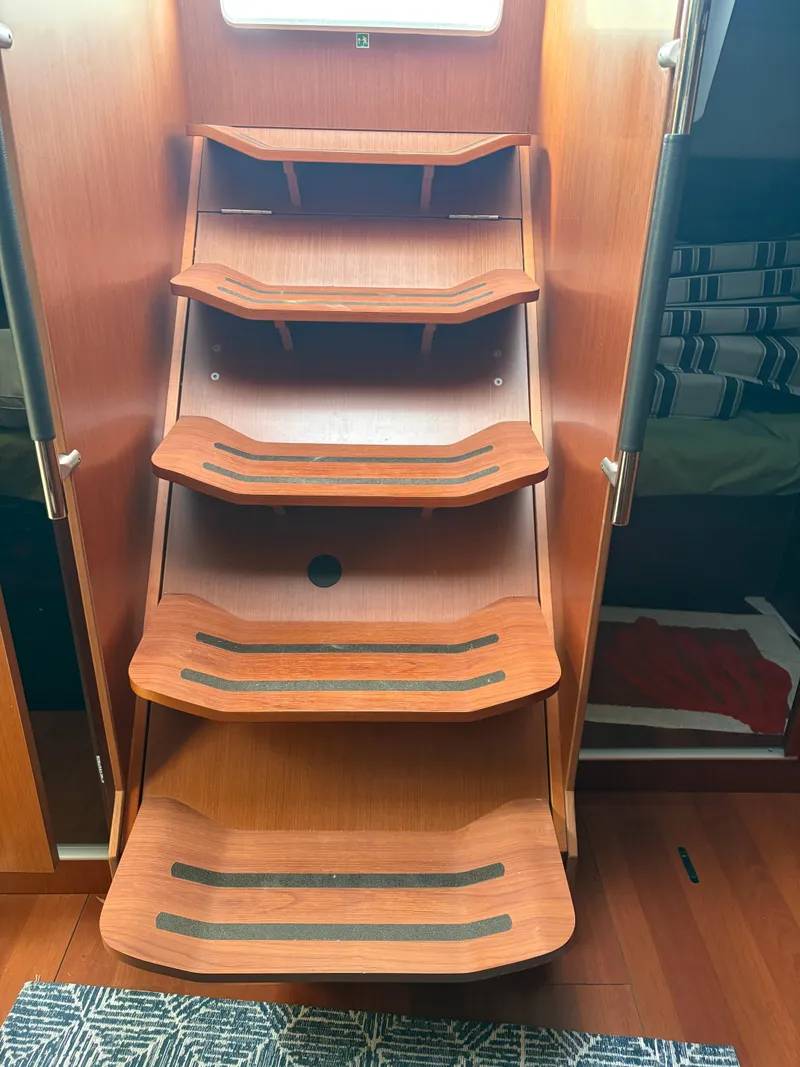 Slide: The Image of Interior wooden stairs of 2018 Beneteau Oceanis 45 yacht. - 22