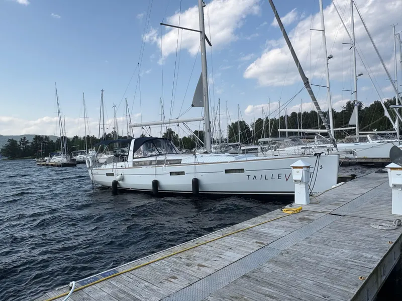 Slide: The Image of 2018 Beneteau Oceanis 45 sailboat docked at marina on a sunny day. - 3