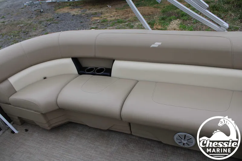 Slide: The Image of Luxurious seating on 2022 Starcraft LX 22 R pontoon boat with cup holders and speaker. - 11