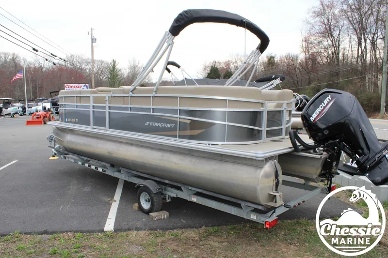 Slide: The Image of 2022 Starcraft LX 22 R pontoon boat on trailer at Chessie Marine dealership. - 4
