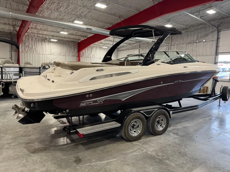 Slide: The Image of 2011 Sea Ray 250 SLX boat on trailer in indoor storage facility. - 4