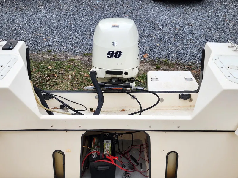 Slide: The Image of 2006 C-Dory 22 Cruiser with Suzuki 90 outboard motor, rear view. - 8