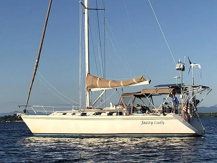 Slide: The Image of 1989 Catalina 42 MkII sailboat "Jazzy Lady" cruising on calm waters. - 1
