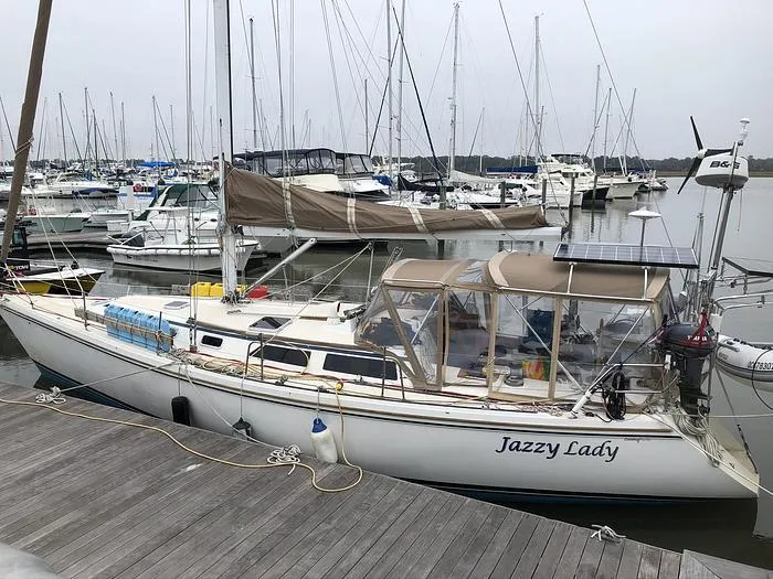 Slide: The Image of Catalina 42 MkII sailboat, 1989 model, docked at marina with other boats. - 3