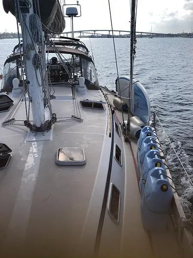 Slide: The Image of Sailing yacht Catalina 42 MkII, 1989 model, on water with jerry cans on deck. - 6