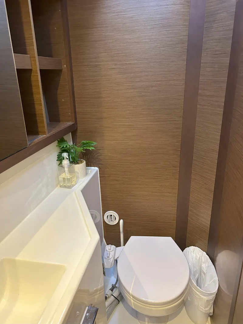 Slide: The Image of Modern bathroom in 2020 Lagoon 40 yacht with sleek design and compact amenities. - 23