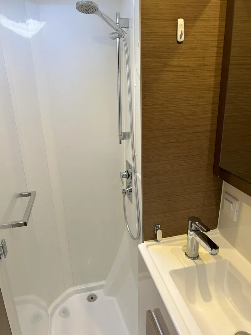 Slide: The Image of Modern bathroom in 2020 Lagoon 40 yacht with shower and sink. - 24