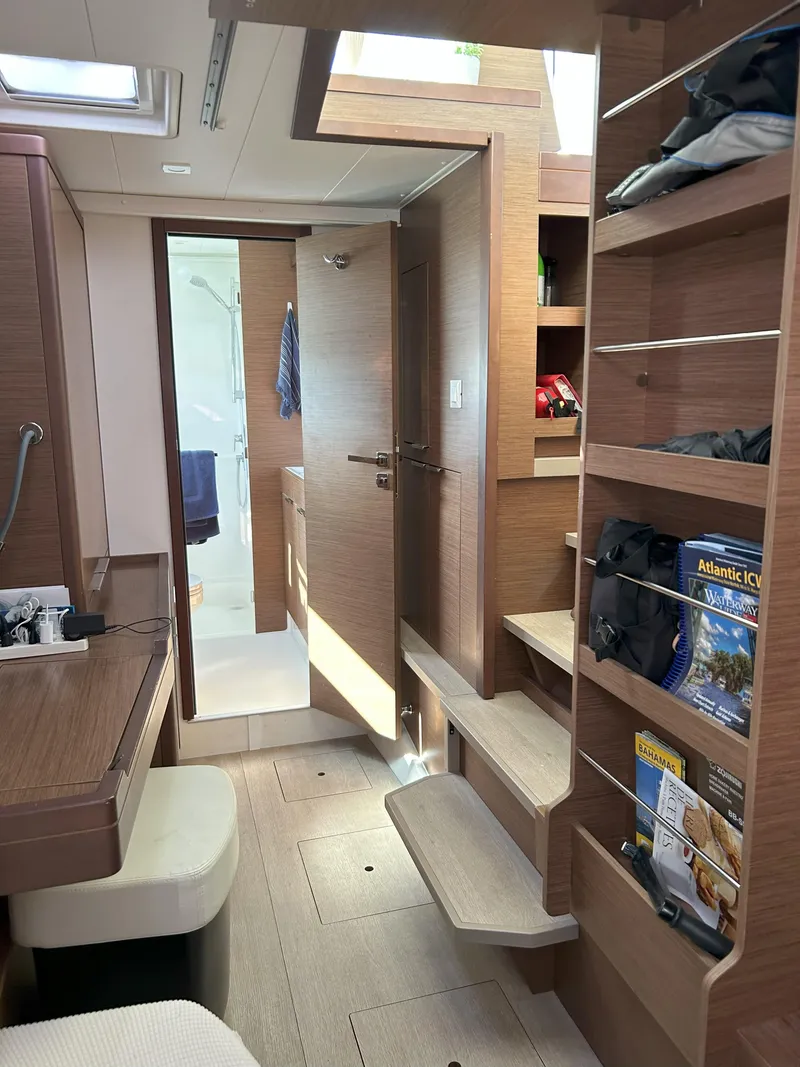 Slide: The Image of Interior of 2020 Lagoon 40 catamaran with wooden finish and modern amenities. - 5