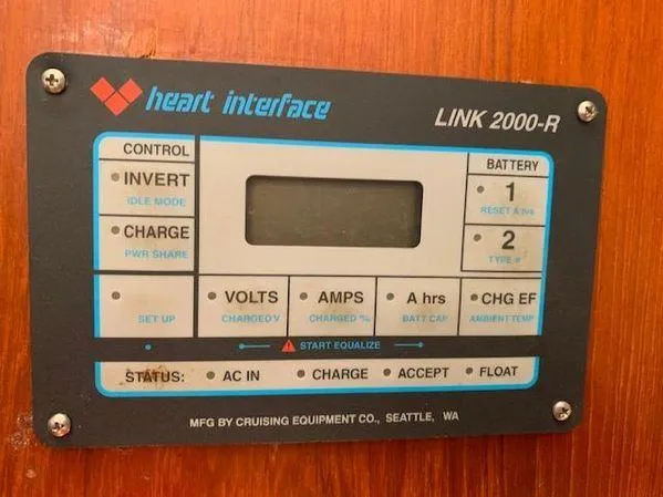 Slide: The Image of Heart Interface Link 2000-R control panel on wooden surface, manufactured by Cruising Equipment Co. - 14