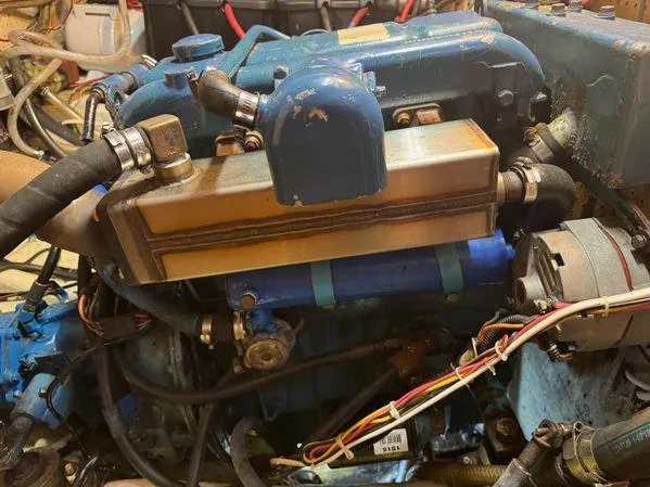 Slide: The Image of 1989 Custom SEA MAID engine with blue components. - 40