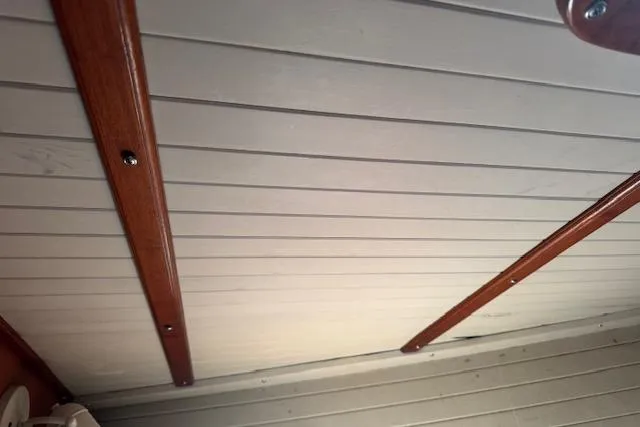 Slide: The Image of Interior ceiling of 1989 Custom SEA MAID boat with wooden beams. - 48