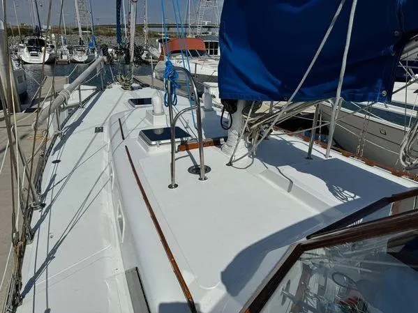 Slide: The Image of Sailboat deck view of 1989 Custom SEA MAID, docked in a marina. - 27