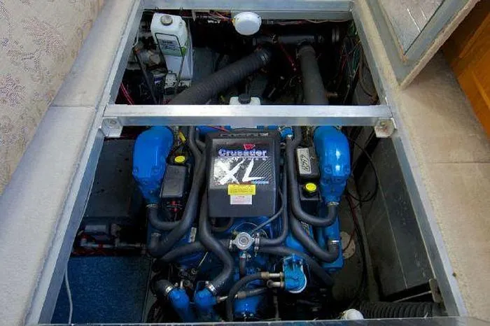 Slide: The Image of Engine compartment of a 1994 Carver 390 with Crusader XL engine. - 13