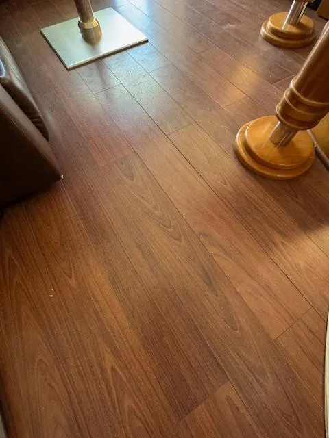 Slide: The Image of Wooden flooring inside a 2002 Carver 570 Voyager Pilothouse yacht. - 36