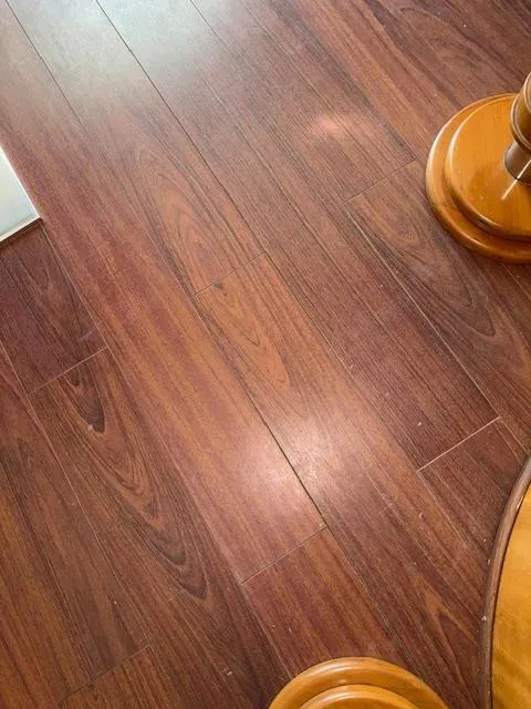 Slide: The Image of Wooden flooring inside a 2002 Carver 570 Voyager Pilothouse yacht. - 35