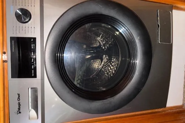 Slide: The Image of Front-loading washing machine in a 2002 Carver 570 Voyager Pilothouse. - 41