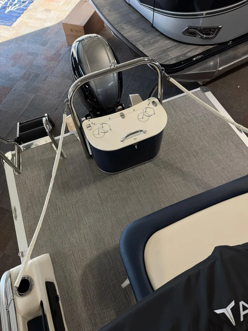 Slide: The Image of 2025 Tahoe Pontoon LTZ Versatile Rear Bench with modern seating and controls. - 5