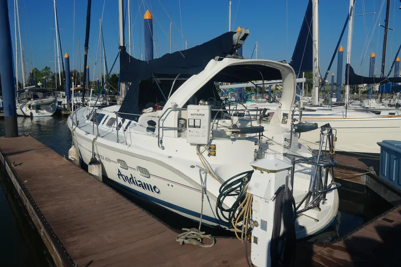 Slide: The Image of Sailboat docked at marina, Hunter 410 model, 1998, named Andiamo. - 4