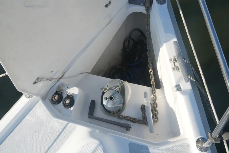Slide: The Image of Anchor locker of 1998 Hunter 410 sailboat with chain and winch. - 7