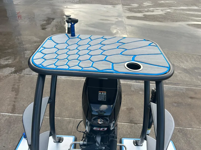 Slide: The Image of 2019 East Cape Fury boat with custom deck design and Suzuki outboard motor. - 22