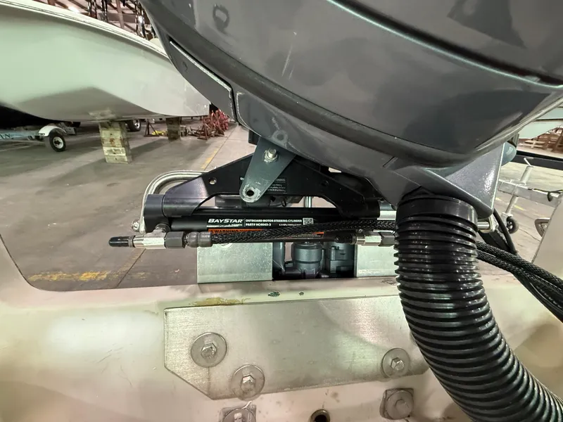 Slide: The Image of Close-up of a 1974 Boston Whaler 17 Montauk boat engine and hydraulic system. - 9